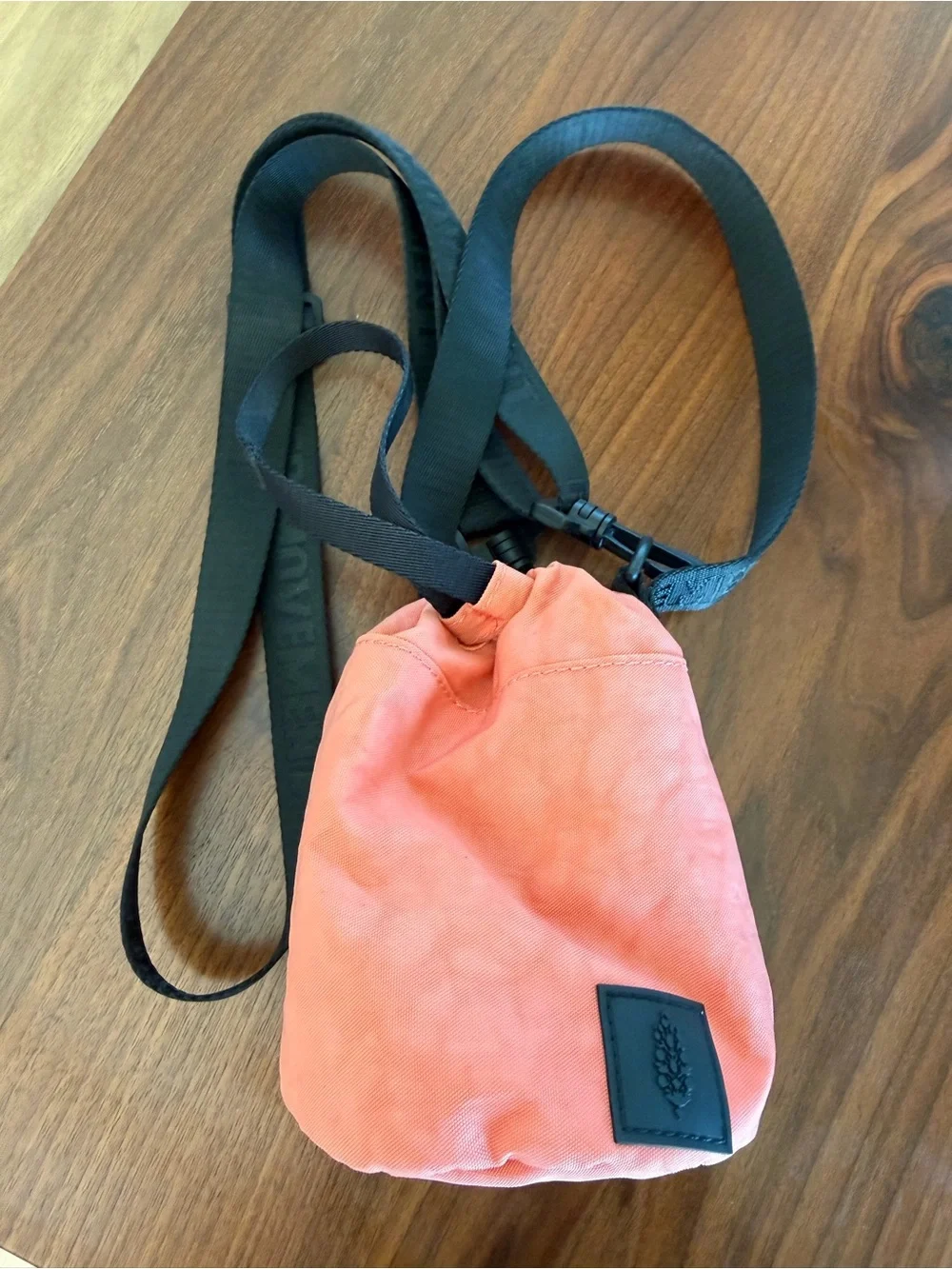 FP Movement by Free People Coral Drawstring Crossbody with Black Strap